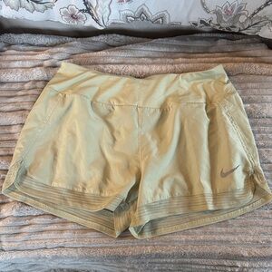 Nike Women’s Light Green Athletic Shorts with Mesh Hem